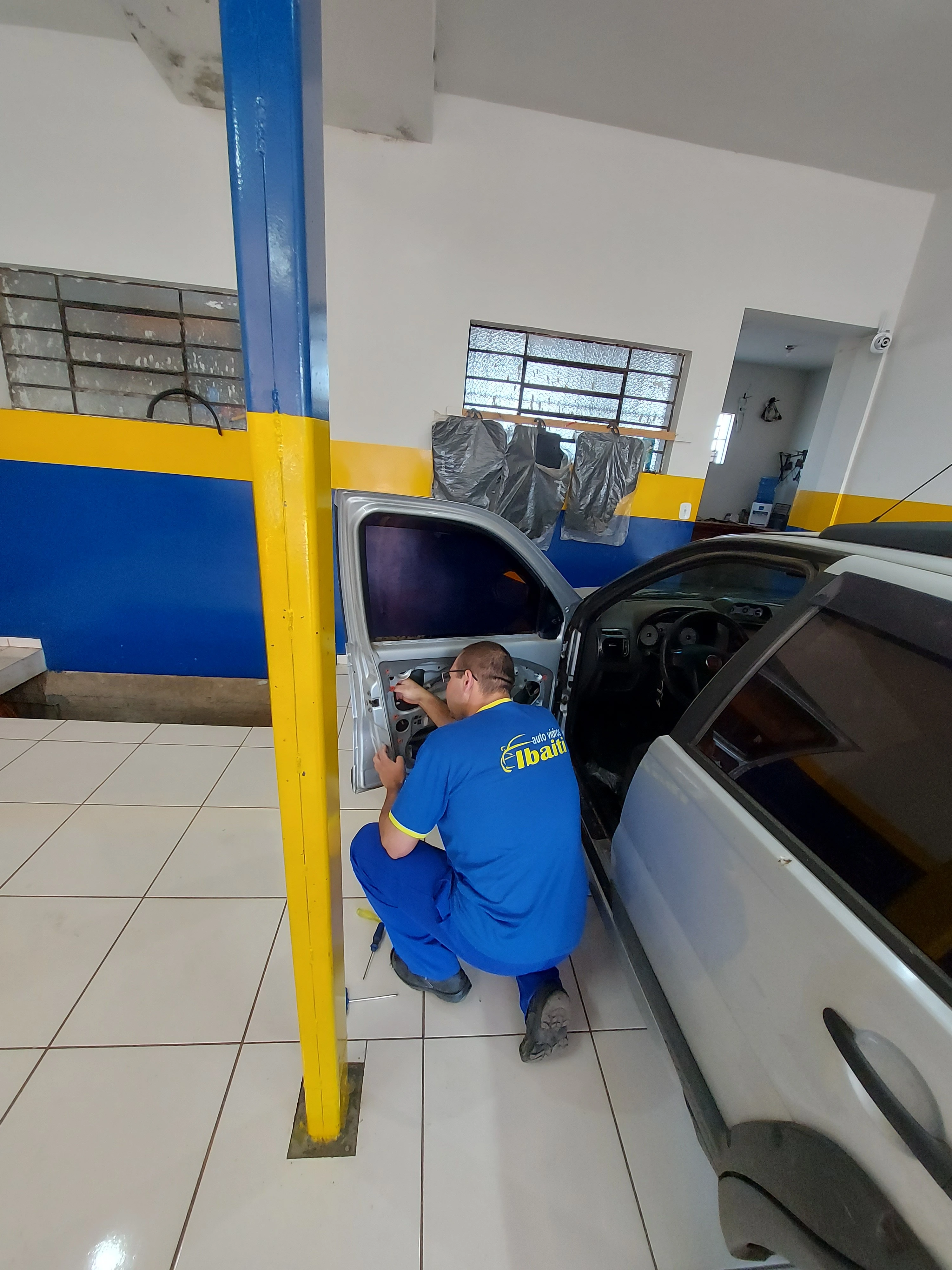 Reparo de máquina de vidro automotiva